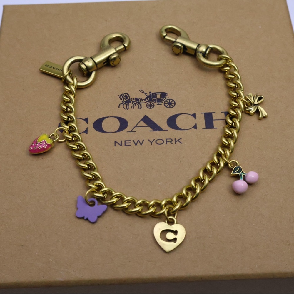 Coach Gold-Tone Charm Bracelet with Pink & Purple Enamel Charms